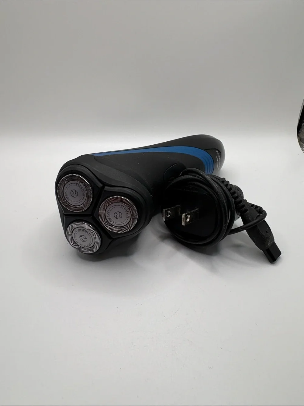 Philips Norelco Shaver 2100 cordless electric rotary razor in black with blue ac